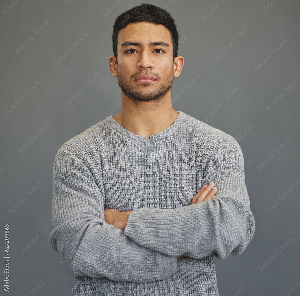 Serious, arms crossed and portrait of man in studio for attitude, moody and focus. Stress, sad and p