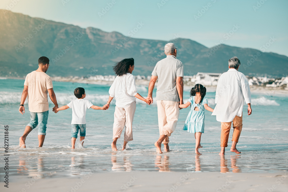 Grandparents, parents or children holding hands at beach as a big family for holiday vacation travel