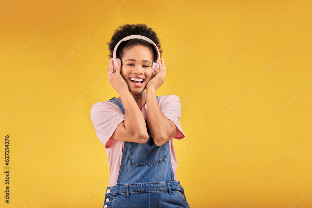 African girl, headphones and studio portrait with smile, youth fashion and sound by yellow backgroun