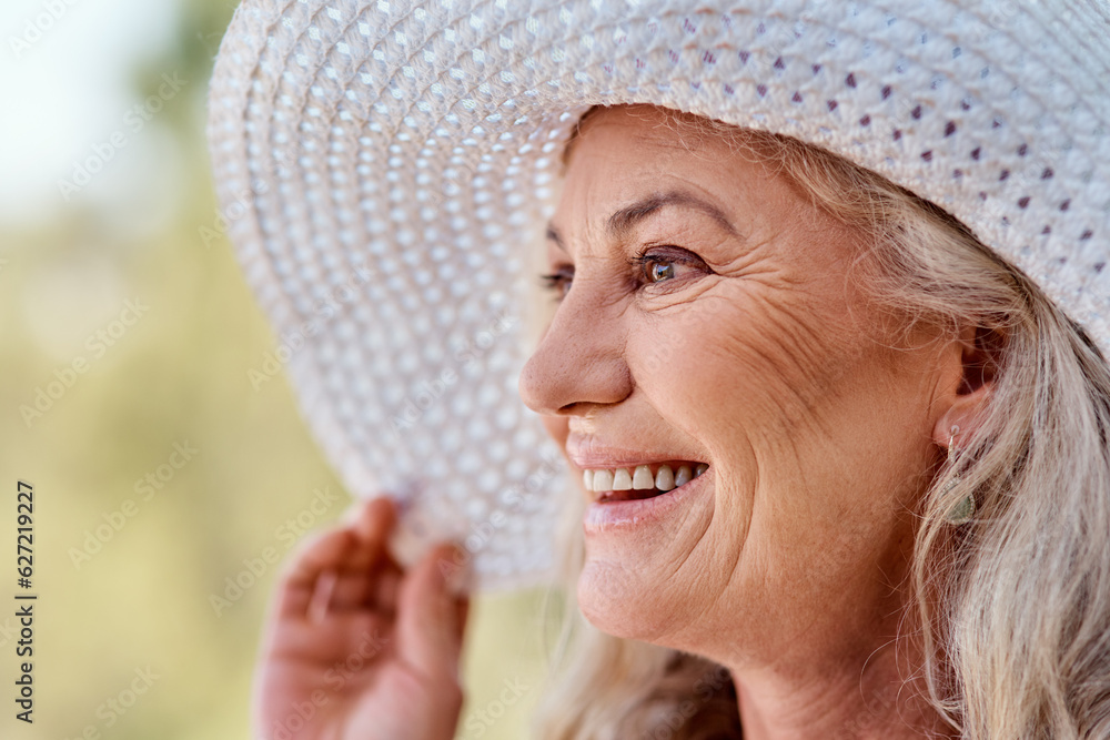 Its the season of smiles. Cropped shot of an attractive senior woman smiling while standing outdoors