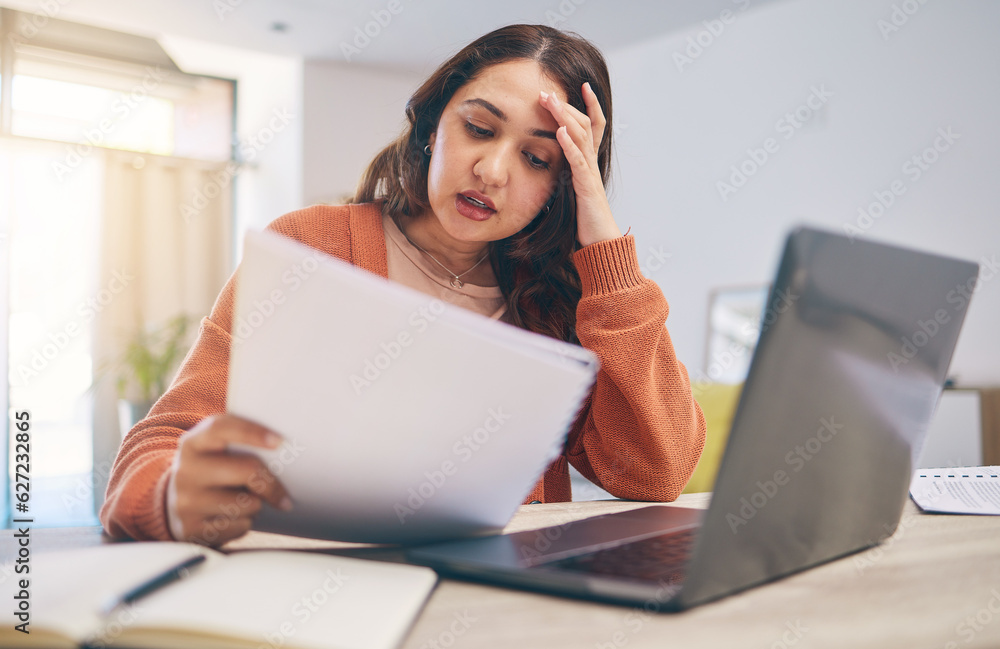 Documents, stress and woman on laptop in home with paperwork for online banking, finance and taxes. 