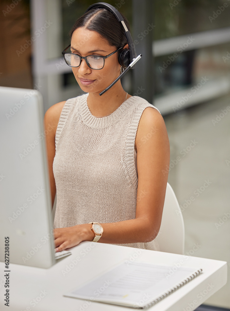 Business woman, call center and web support communication at a computer in a office. Phone conversat