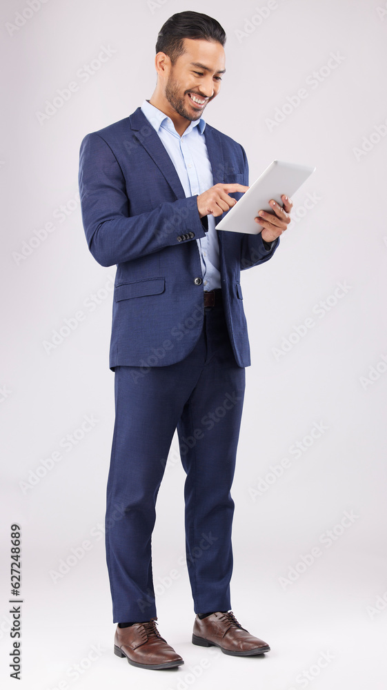 Happy asian man, business and tablet in studio for online planning, data trading and internet info o