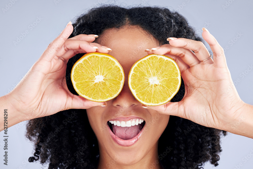 Woman, lemon eyes and wellness in studio with comic smile, health and skincare with nutrition by bac