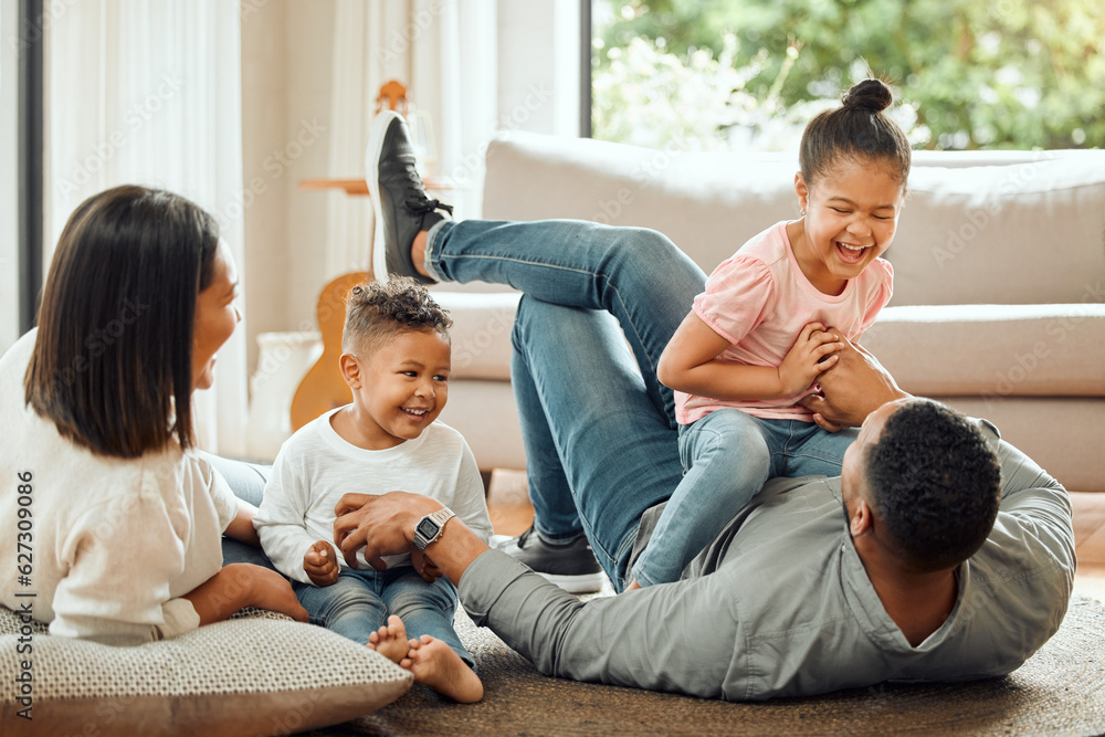 Happy family, laughing and playing on floor in living room for fun bonding relationship together at 