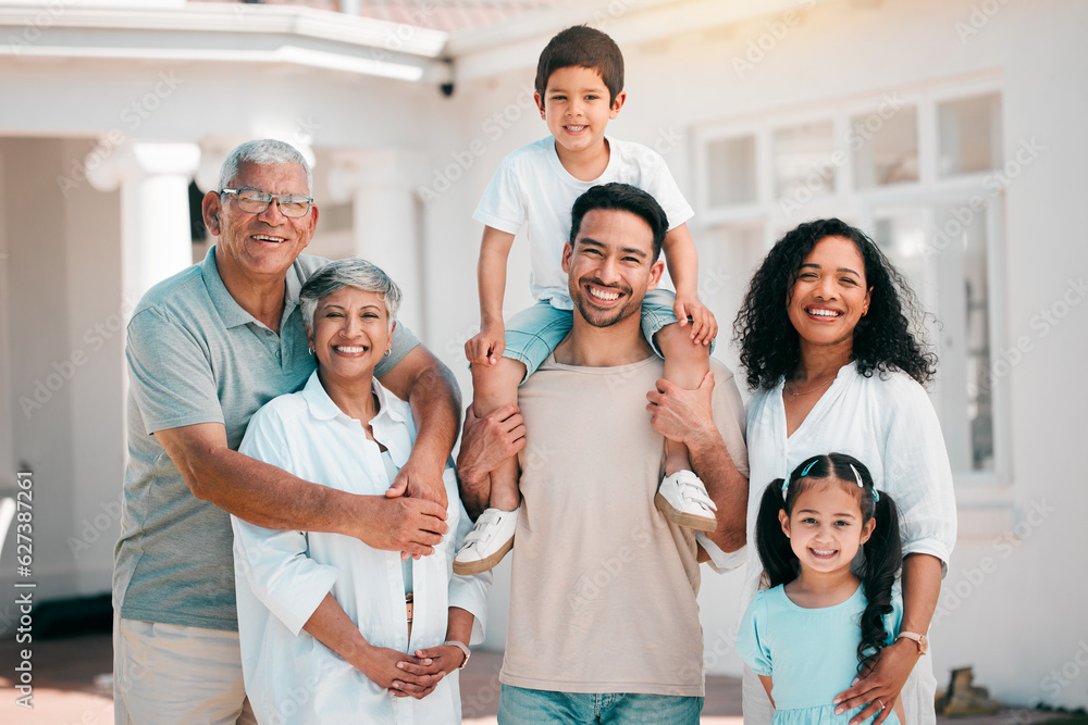 Happy, smile and portrait of big family outdoor together in the backyard of their modern house. Happ