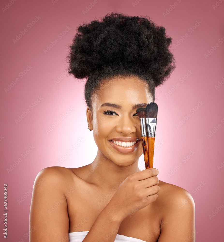 Portrait, makeup and black woman with brushes, skincare and dermatology against a pink studio backgr