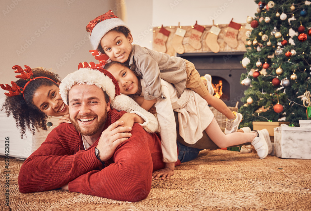 Christmas, portrait and happy family in home on floor, bonding and together. Xmas, smile and face of