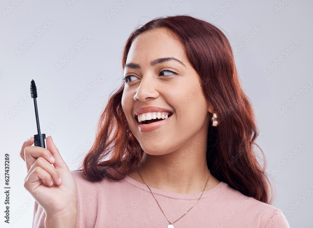 Smile, beauty or happy girl with mascara makeup, cosmetics or product brush laughing in studio. Woma