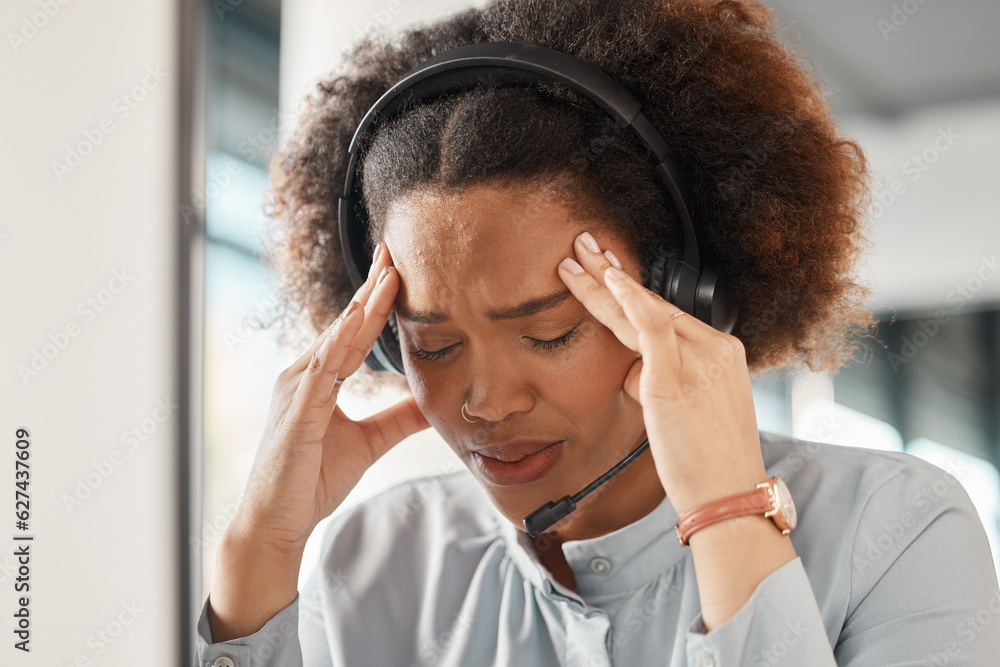 Woman, stress headache and call center in office, headphones and microphone for young crm with pain.