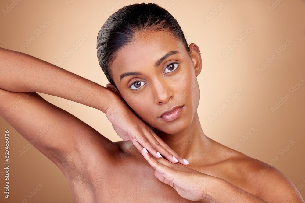 Beauty, portrait and indian girl for skincare with hands in brown studio background. Dermatology, fa