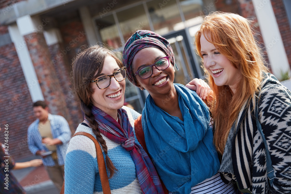 Friends make student life all the more fun. Portrait of a group of university students on campus.