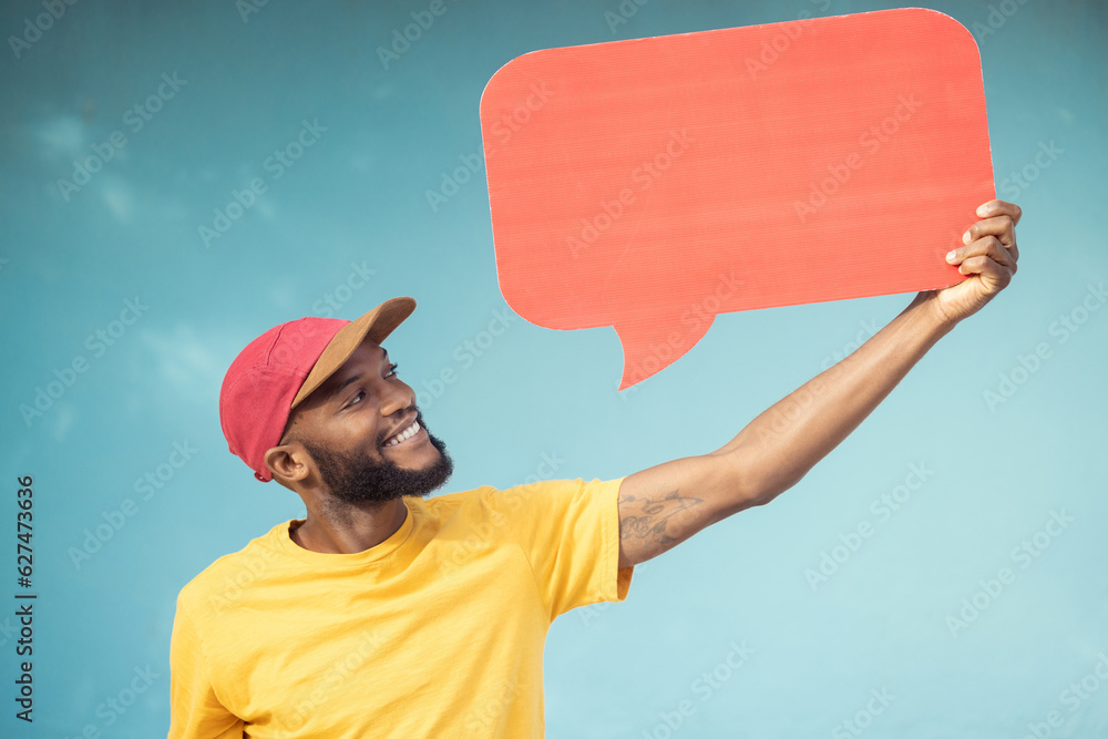 Advertising, speech bubble and black man on blue background for announcement, news and information. 