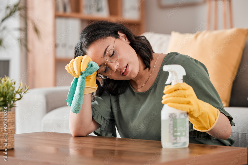 Tired woman, housekeeper and headache with detergent for cleaning furniture, hygiene or bacterial re