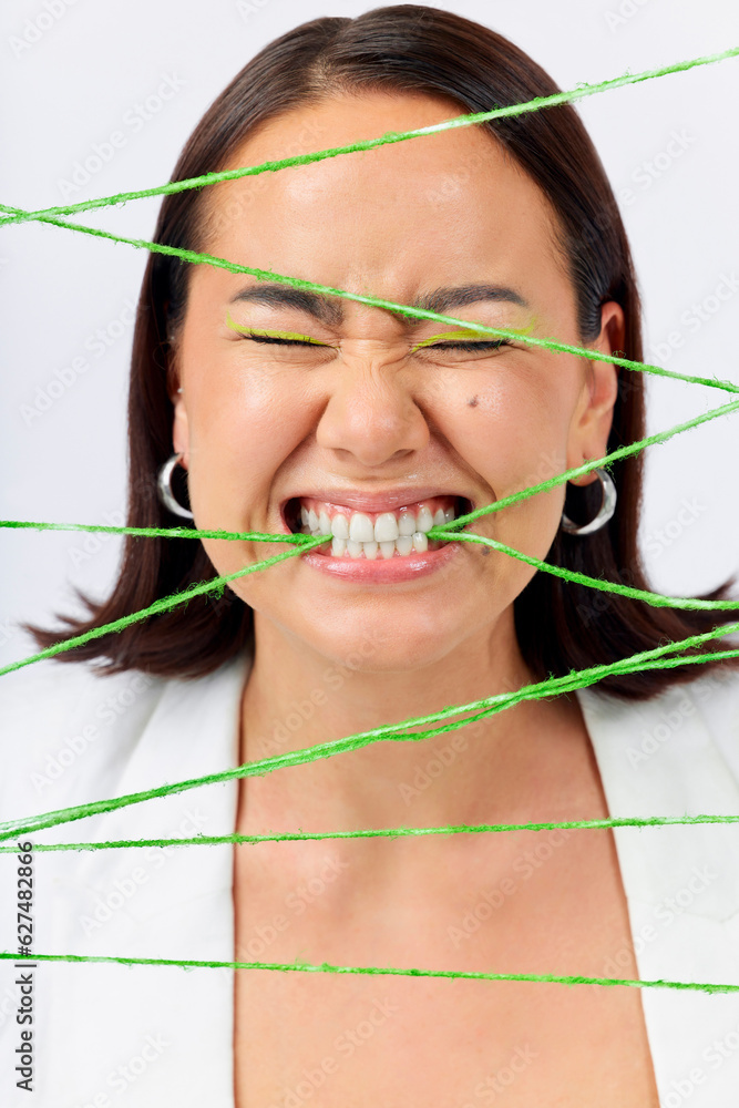 Crazy, biting rope and a woman on a white background with mental health problem or funny. Stress, yo