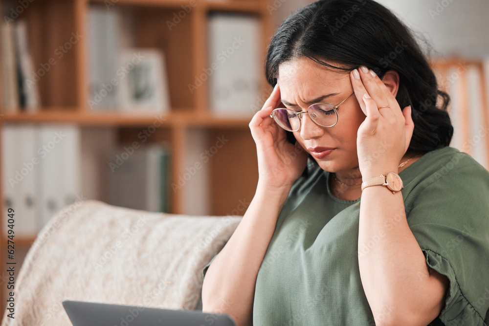 Stress, headache and woman in her living room working on a deadline project on a laptop for remote j