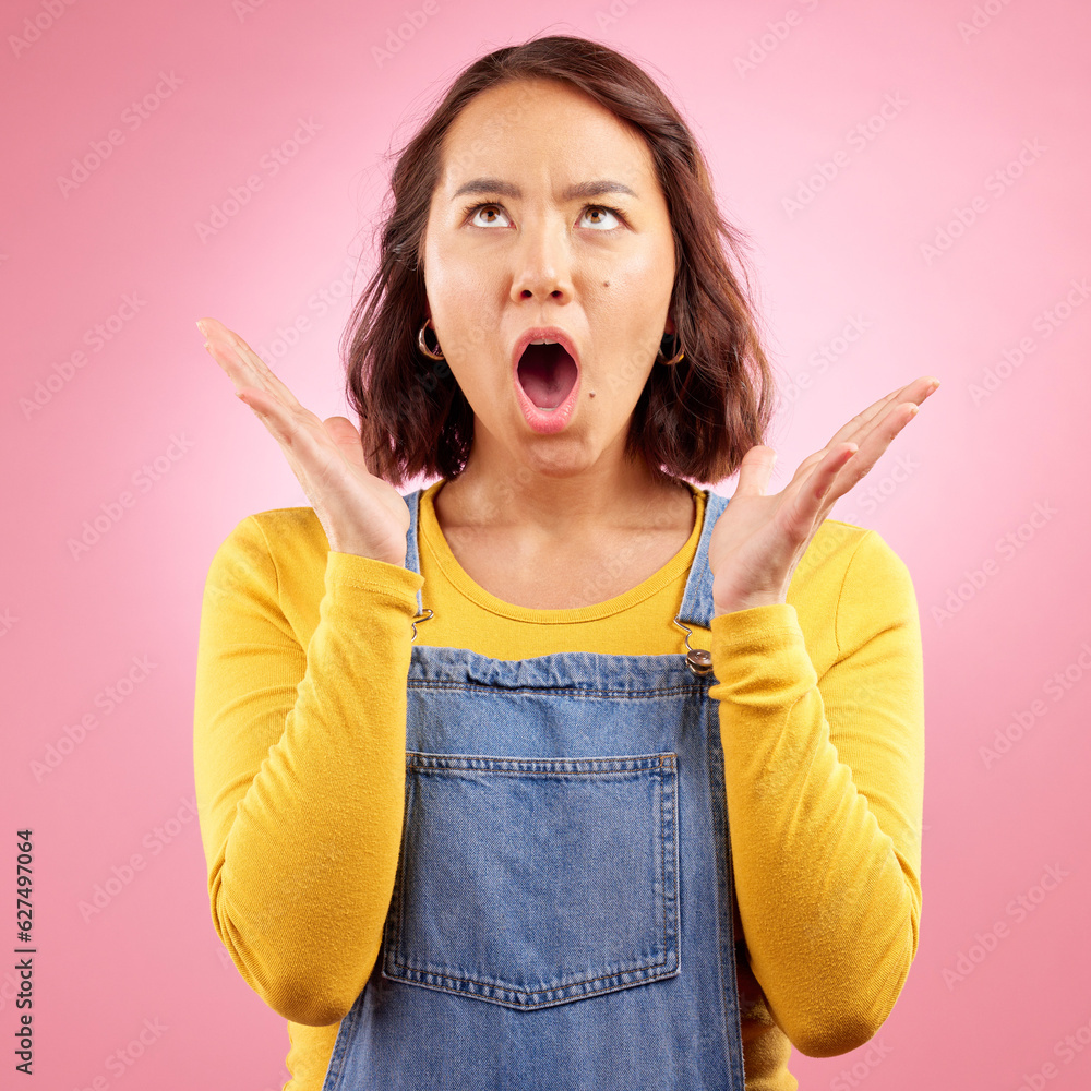 Surprise, news and asian woman with wow face in studio for deal, offer or promo on pink background. 