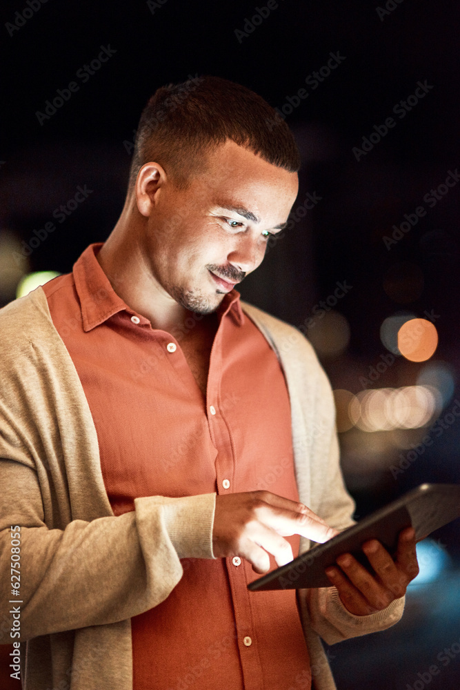 The internet is full of success stories. Cropped shot of a businessman using a digital tablet while 