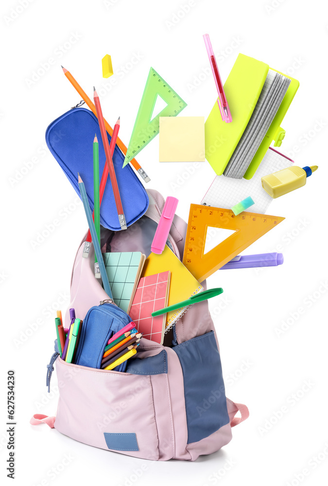 School backpack and stationery on white background