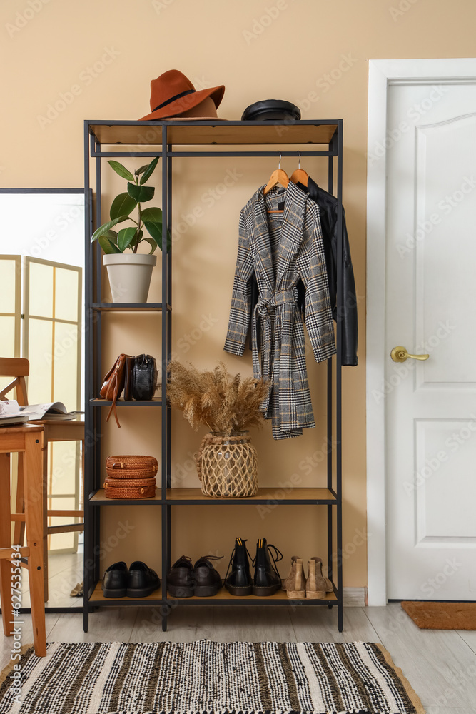 Interior of hall with shelving unit and mirror