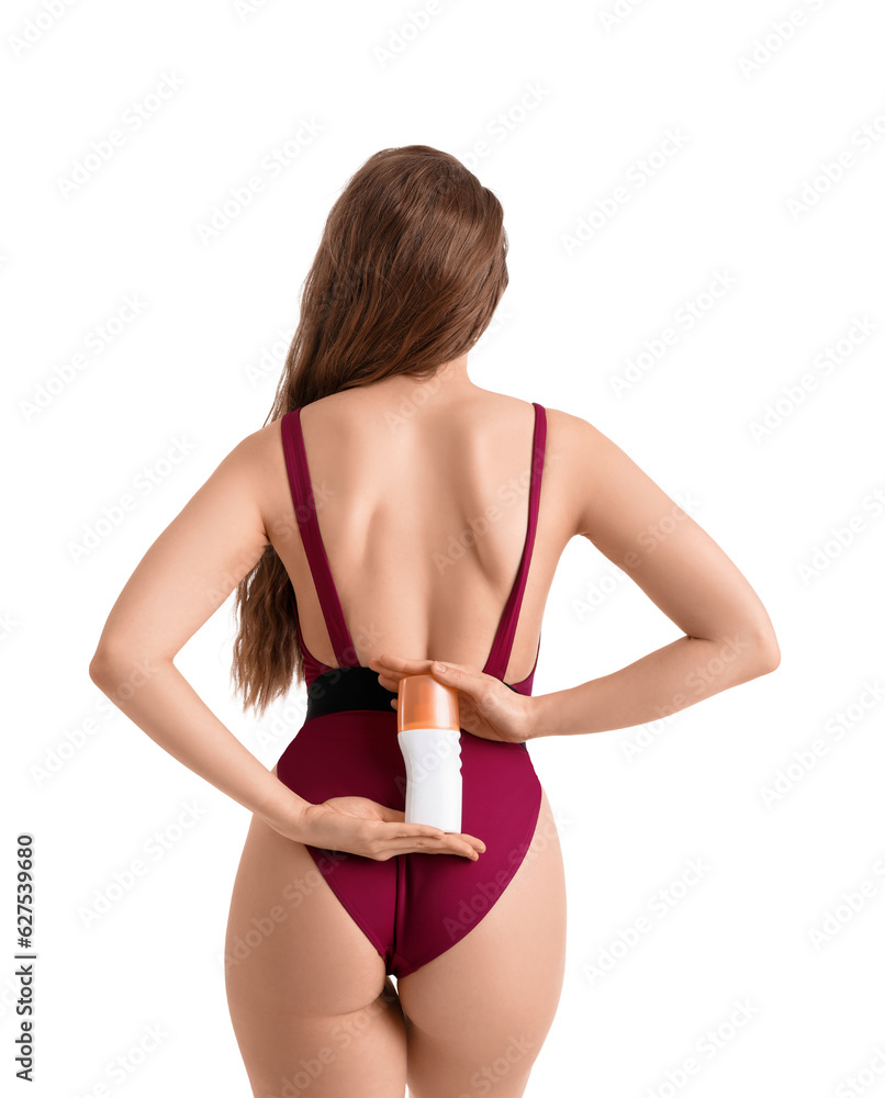 Beautiful young woman with sunscreen cream on white background, back view