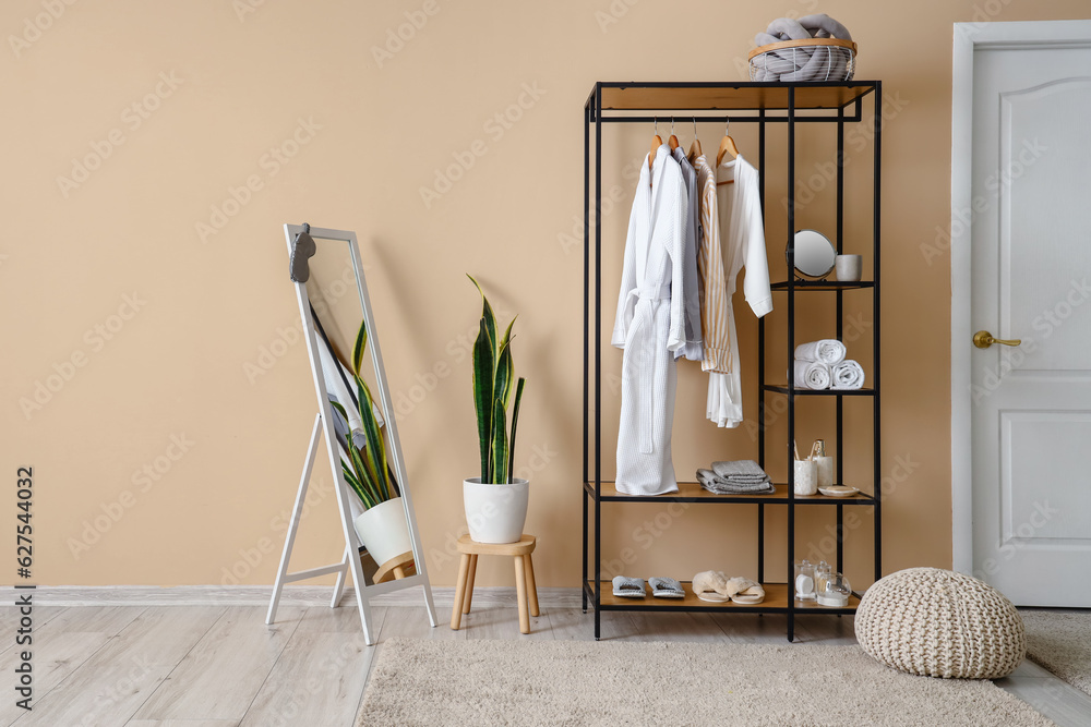 Interior of room with shelving unit and bath accessories