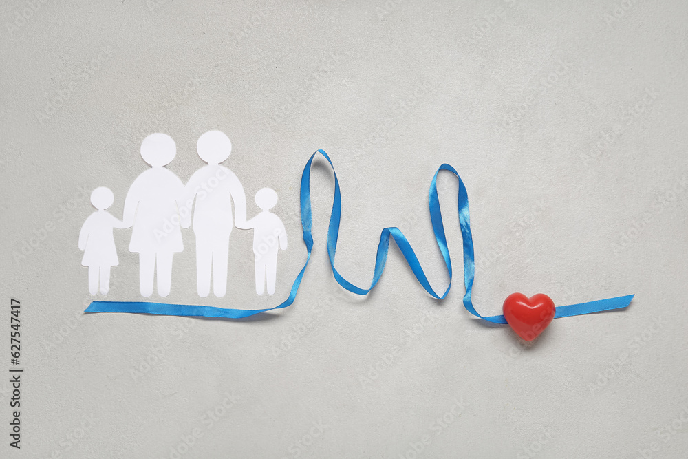 Family figures with ribbon in shape of diagram and heart on white background. Health care concept