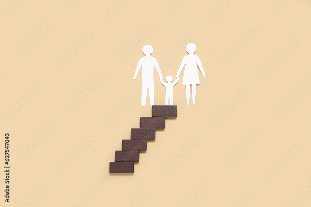 Figures of family and ladder on beige background