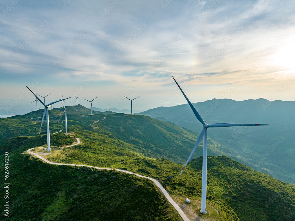 Wind farm on the mountain, blue sky and white clouds