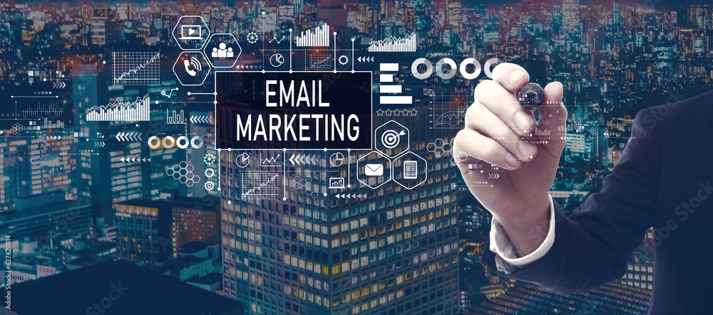 Email marketing with businessman in a city at night