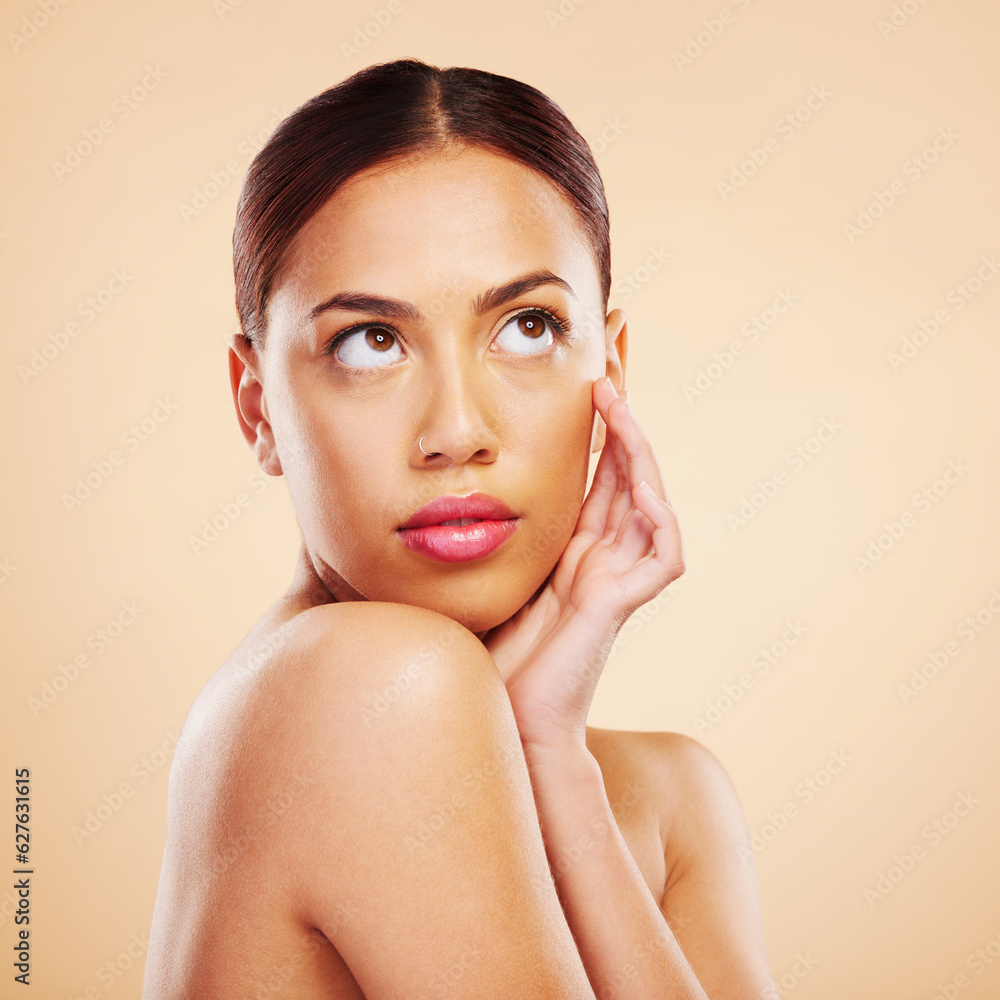 Face touch, beauty skincare and woman in studio isolated on a brown background mockup space. Cosmeti