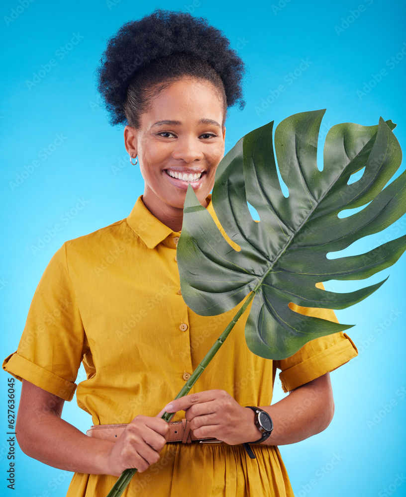 Fashion, portrait and black woman with plant on blue background for eco friendly, organic and natura