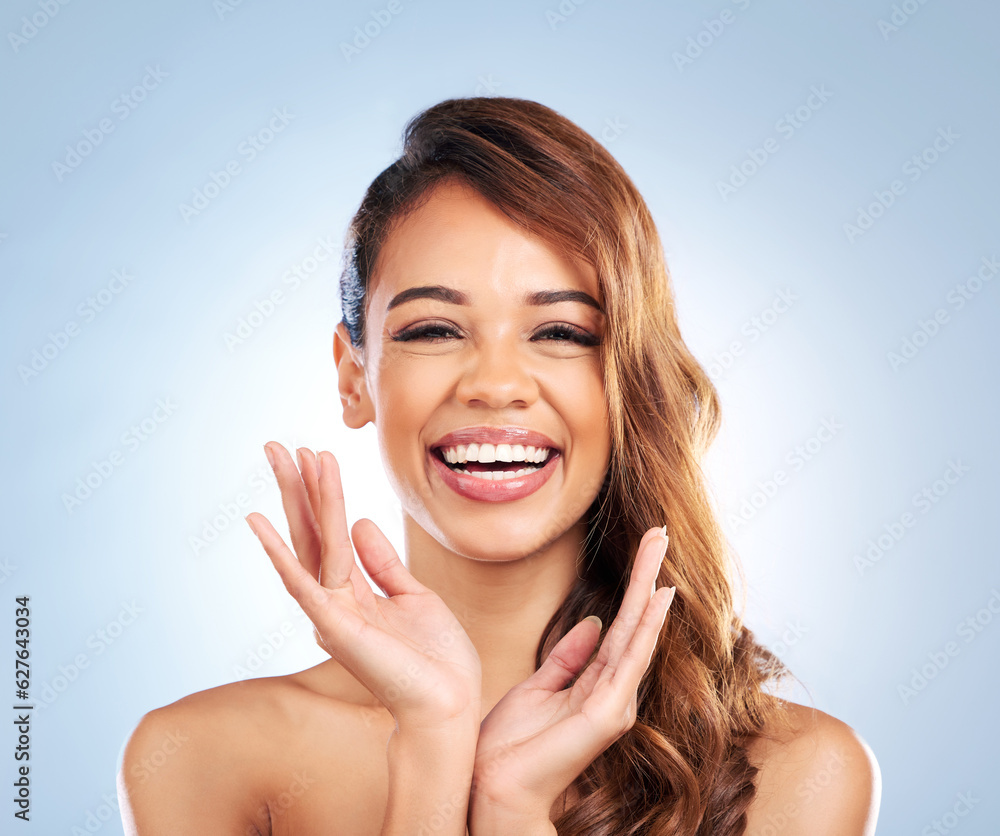 Portrait, hair care or happy woman laughing with beauty, wellness or skincare in studio on blue back