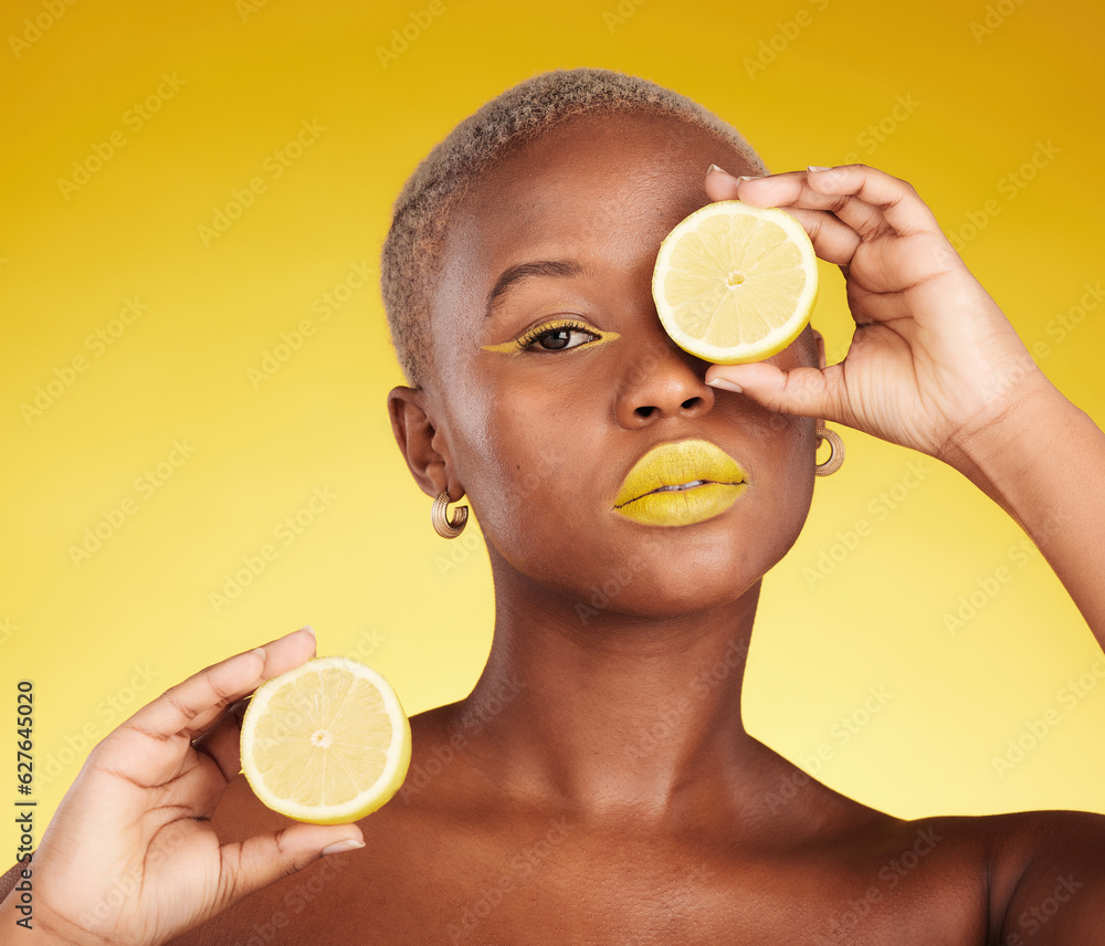 Black woman, portrait and lemon for vitamin C or natural beauty against a yellow studio background. 