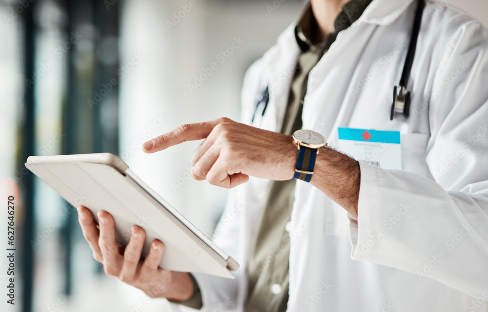 Hands, tablet and man doctor typing message, social media or planning online schedule in hospital. T