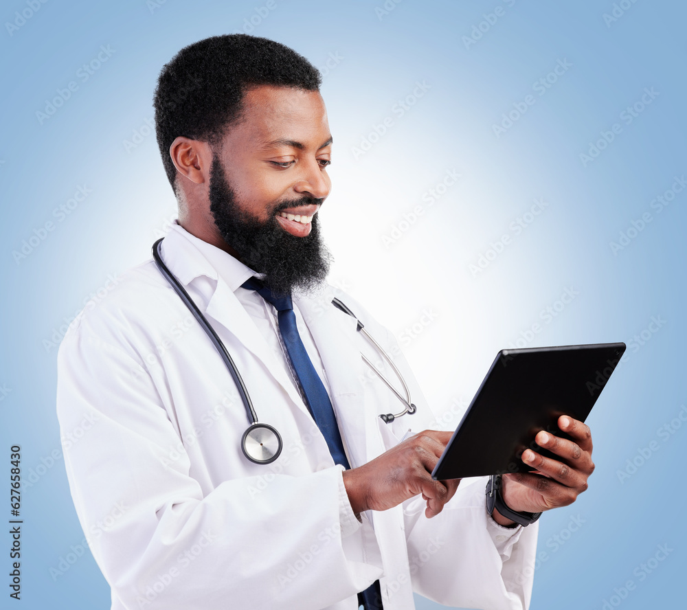 Healthcare, tablet and a black man doctor on a blue background in studio for cardiology research. Me