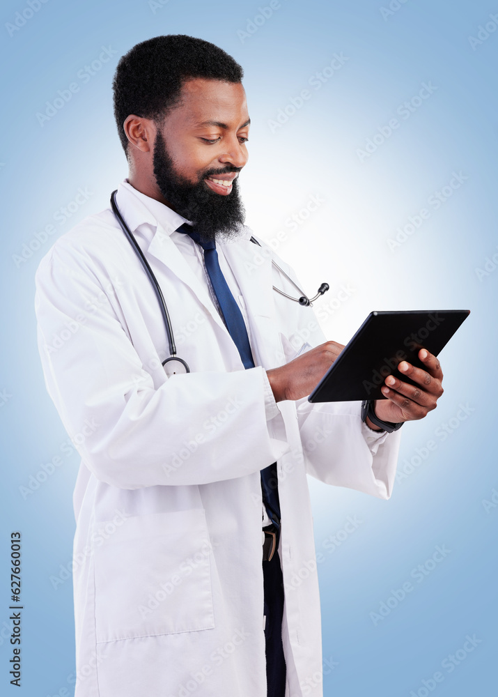 Medical, tablet and a black man doctor in studio on a blue background for cardiology research. Healt