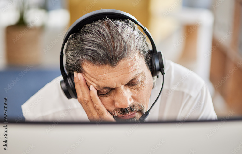 Exhausted, customer service and male consultant sleeping in his office doing an online consultation.