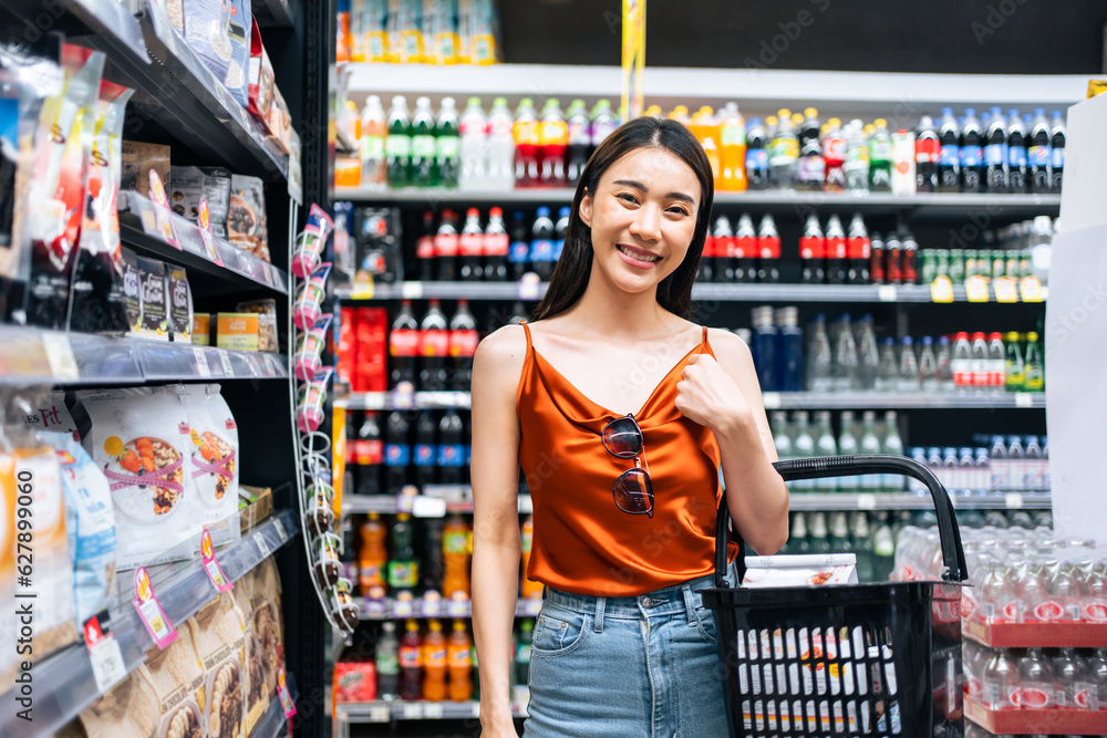 Portrait of Asian woman shopping goods outdoor in department store. 