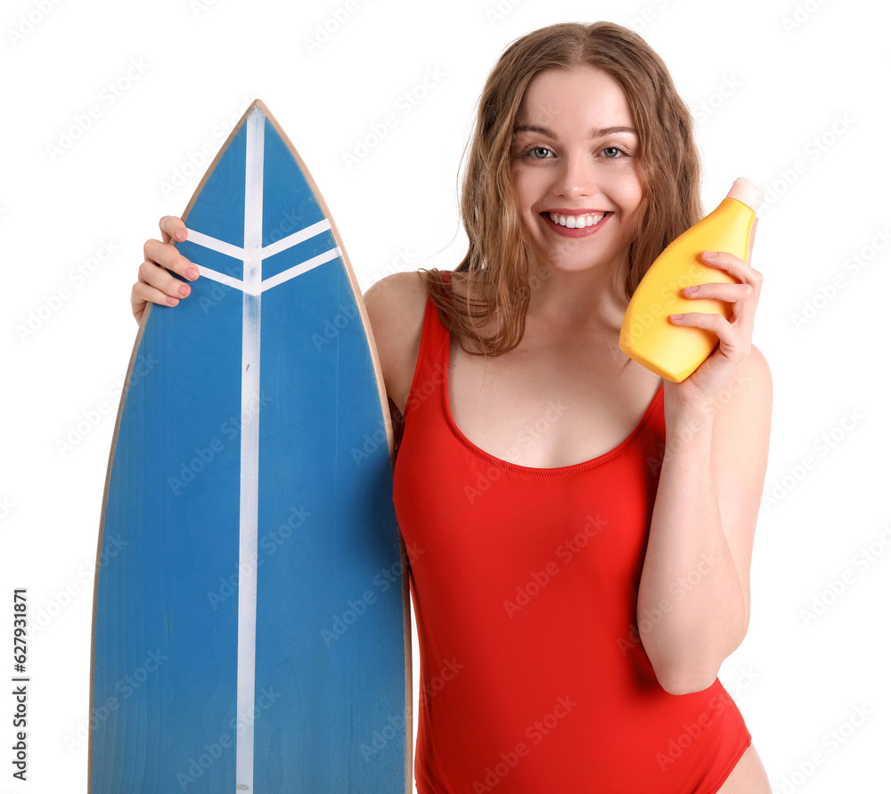 Beautiful young woman with sunscreen cream and surfboard on white background