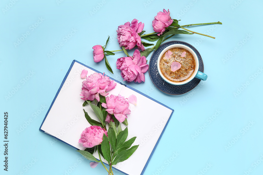 Composition with cup of coffee, book and beautiful peony flowers on color background