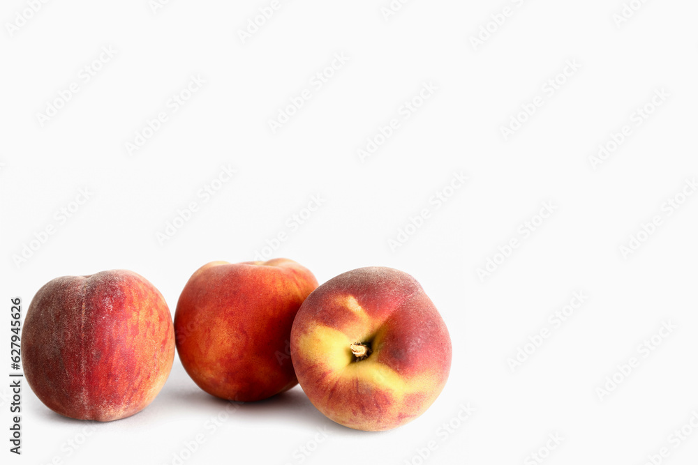 Sweet peaches on white background