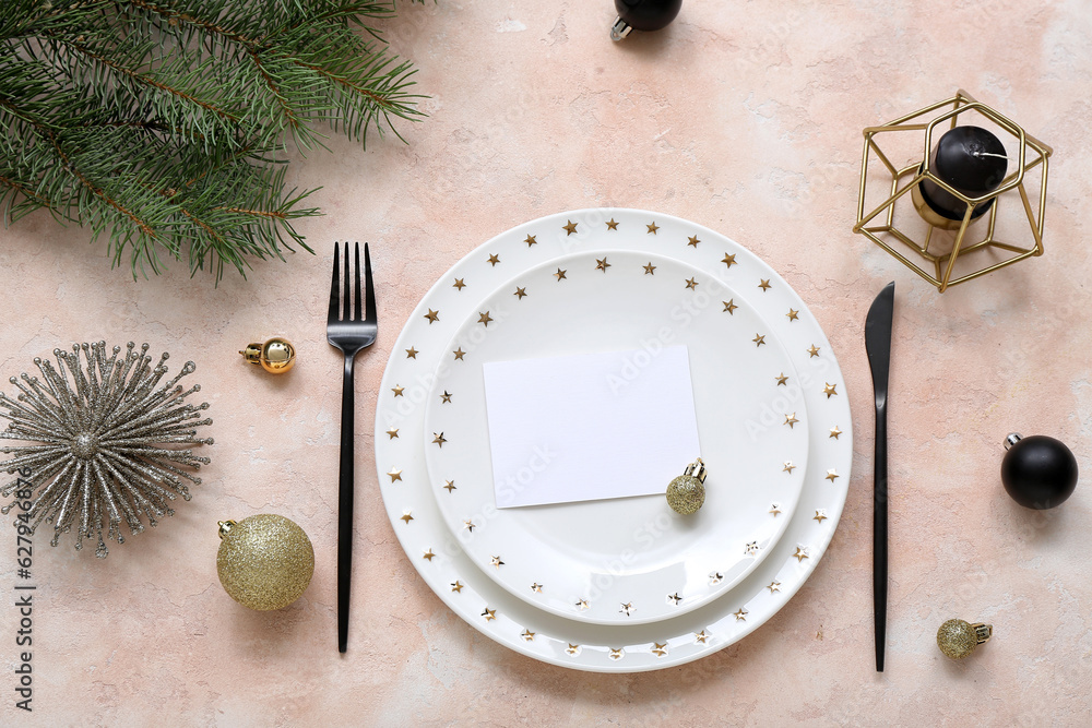 Beautiful table setting for Christmas celebration on beige background