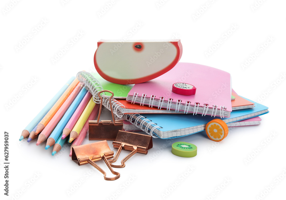 Notebooks and school stationery on white background