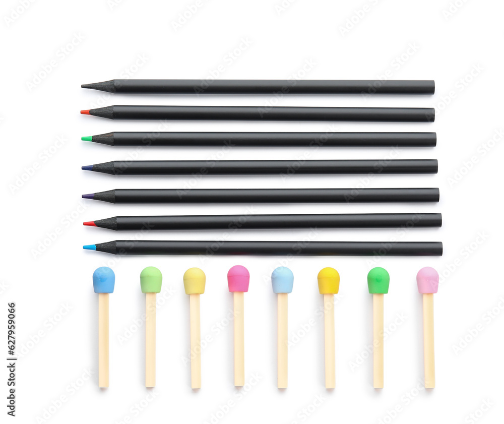 Colorful pencils and erasers in shape of matches on white background