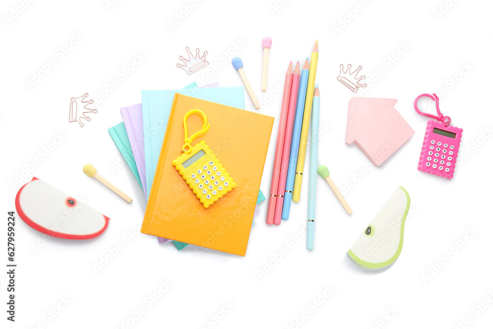 Notebooks and school stationery on white background