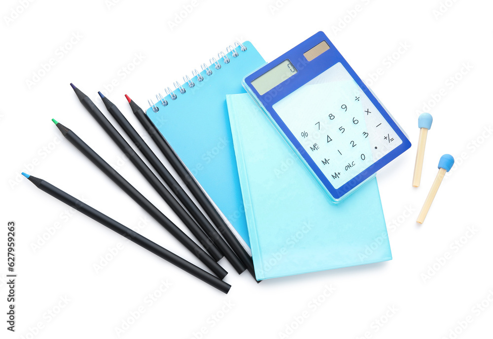 Notebooks and school stationery on white background