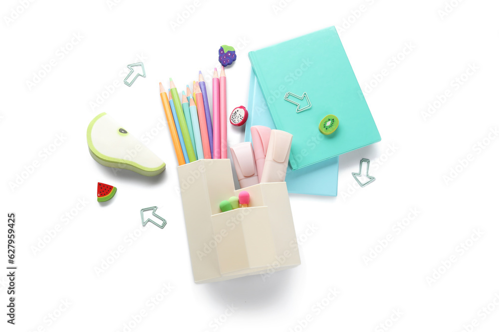 Cups with school stationery and notebooks on white background