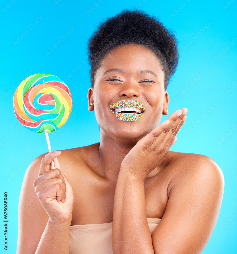 Candy, portrait and woman with sprinkles on her lips in a studio with sweet treats, dessert or snack