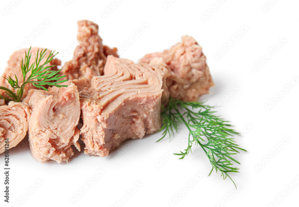 Delicious canned tuna with fresh herbs isolated on white background